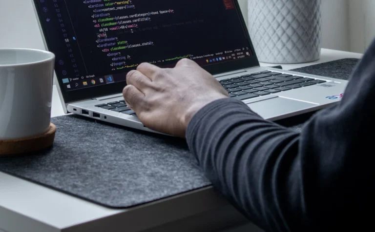 Developer fixing a WordPress site on a laptop